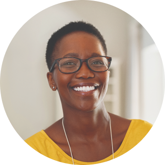 Woman with glasses smiling
