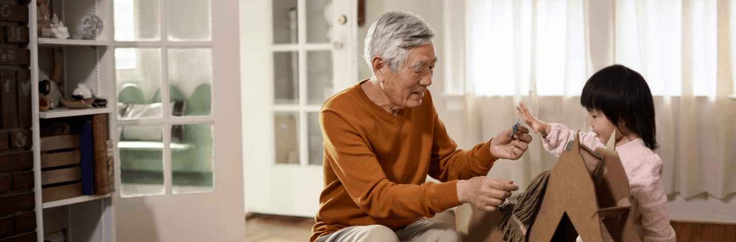 Grandfather playing with granddaughter