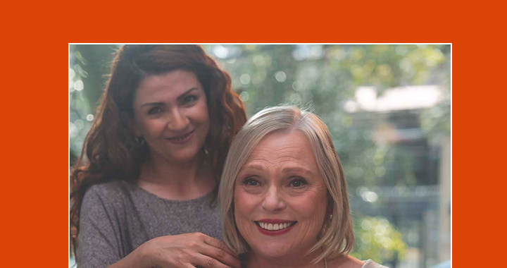 Two women smiling with one standing behind the other, RYBREVANT FASPRO™ treatment journal